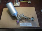 Anest Iwata LPH-400 High Performance Gravity Feed Spray Gun + Cup Purple Cap Used. Price: $375.00.
